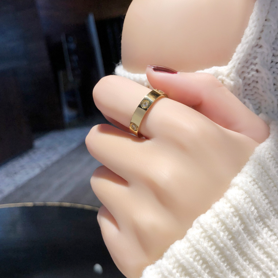 guld ring med små