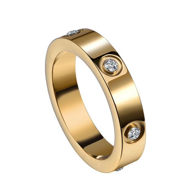 guld ring med små